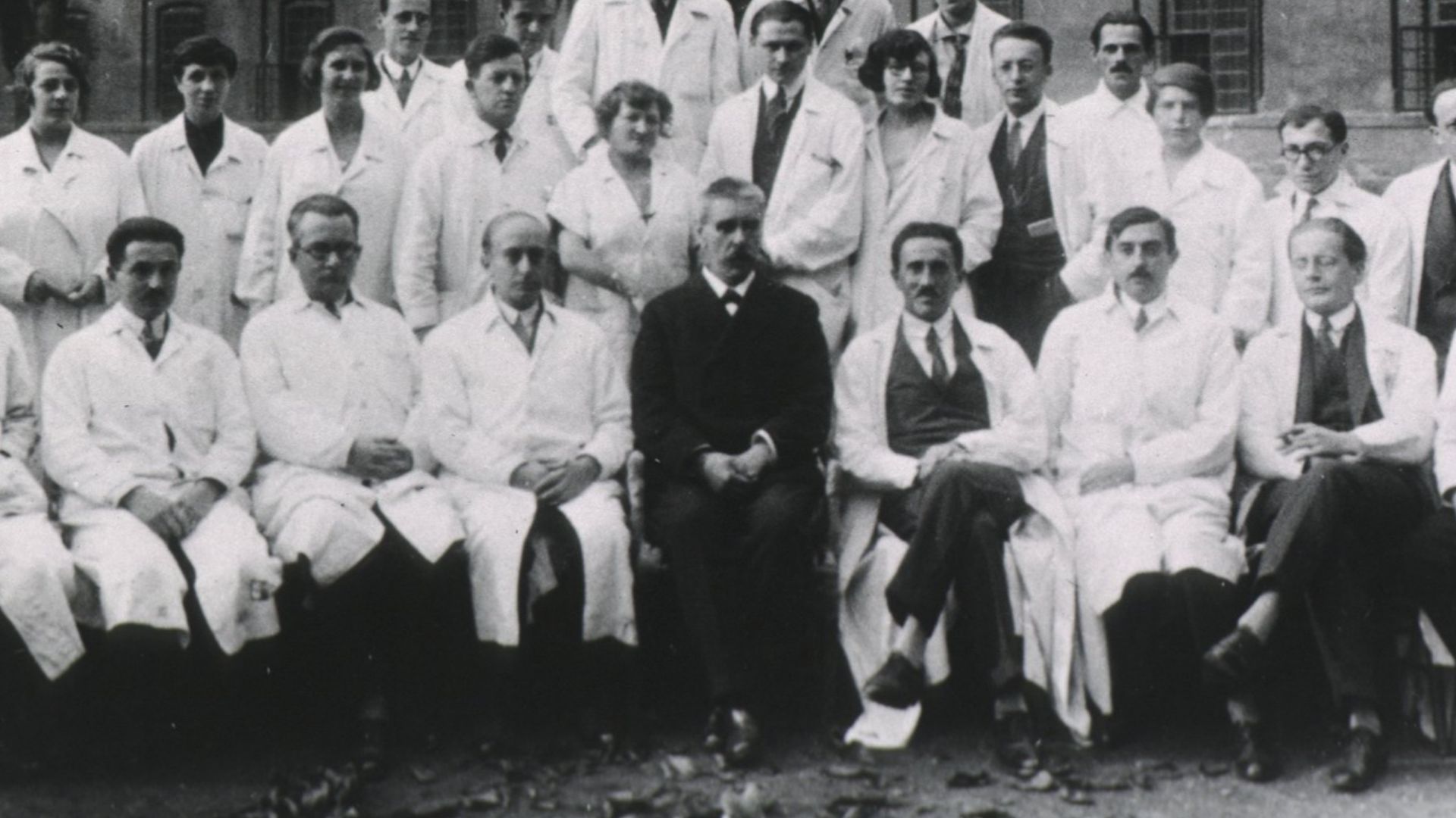 Julius Wagner-Jauregg's staff in 1927. Front row (left to right): Max Weissmann, Bernhard Dattner, Heinrich Kogerer, Heinrich Herschmann, Julius Wagner-Jauregg, Josef Gerstmann, Paul Schilder, Heinz Hartmann, Otto Kauders. Second row (left to right): Erwi
