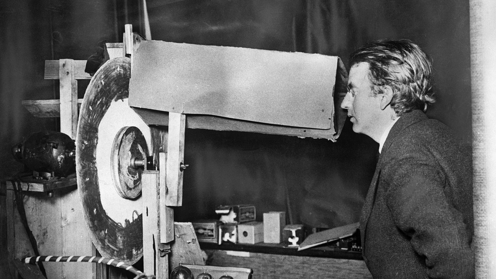 John Logie Baird looking into the receiver