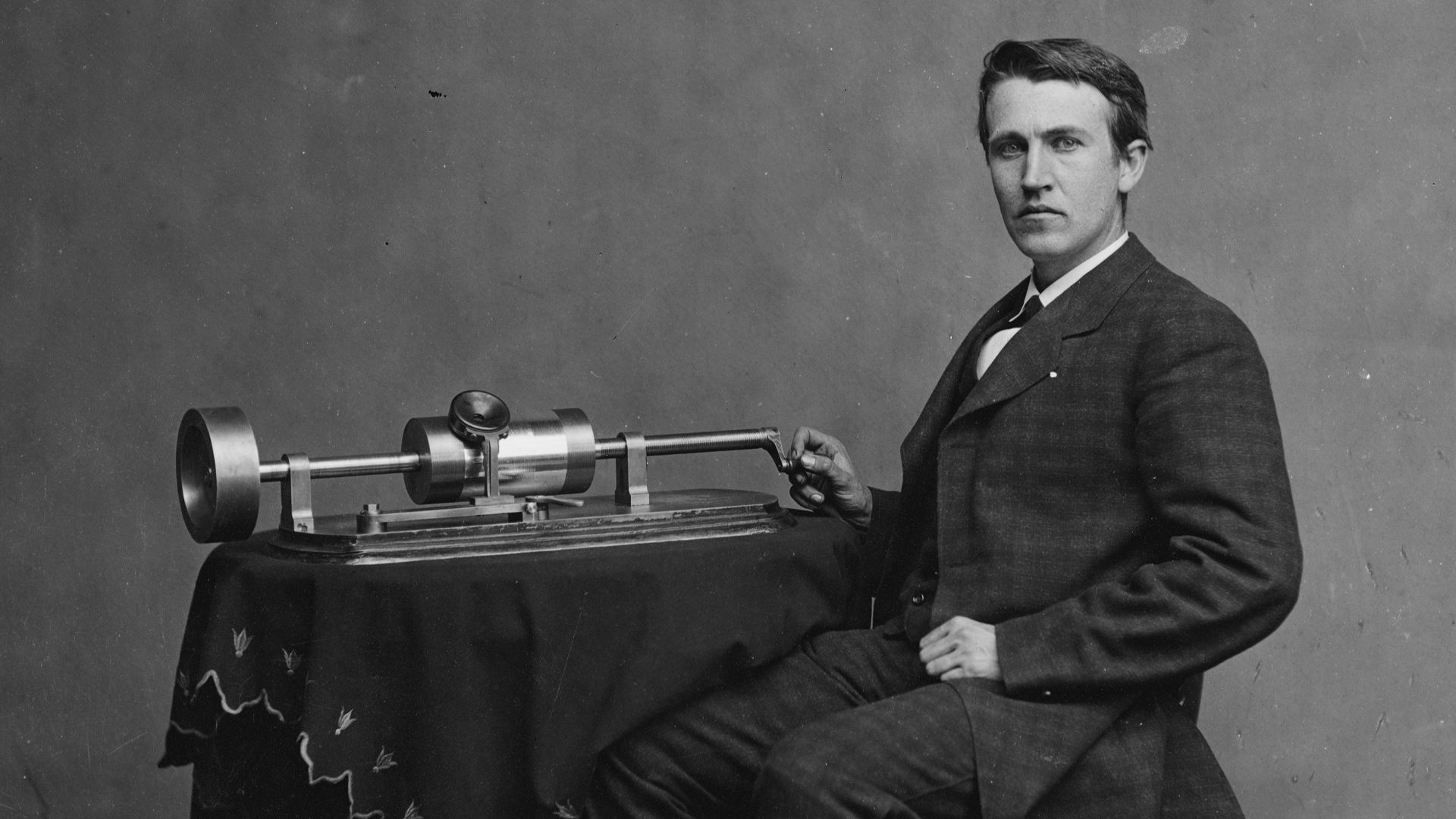Thomas Edison and his early phonograph.  Cropped from Library of Congress copy.