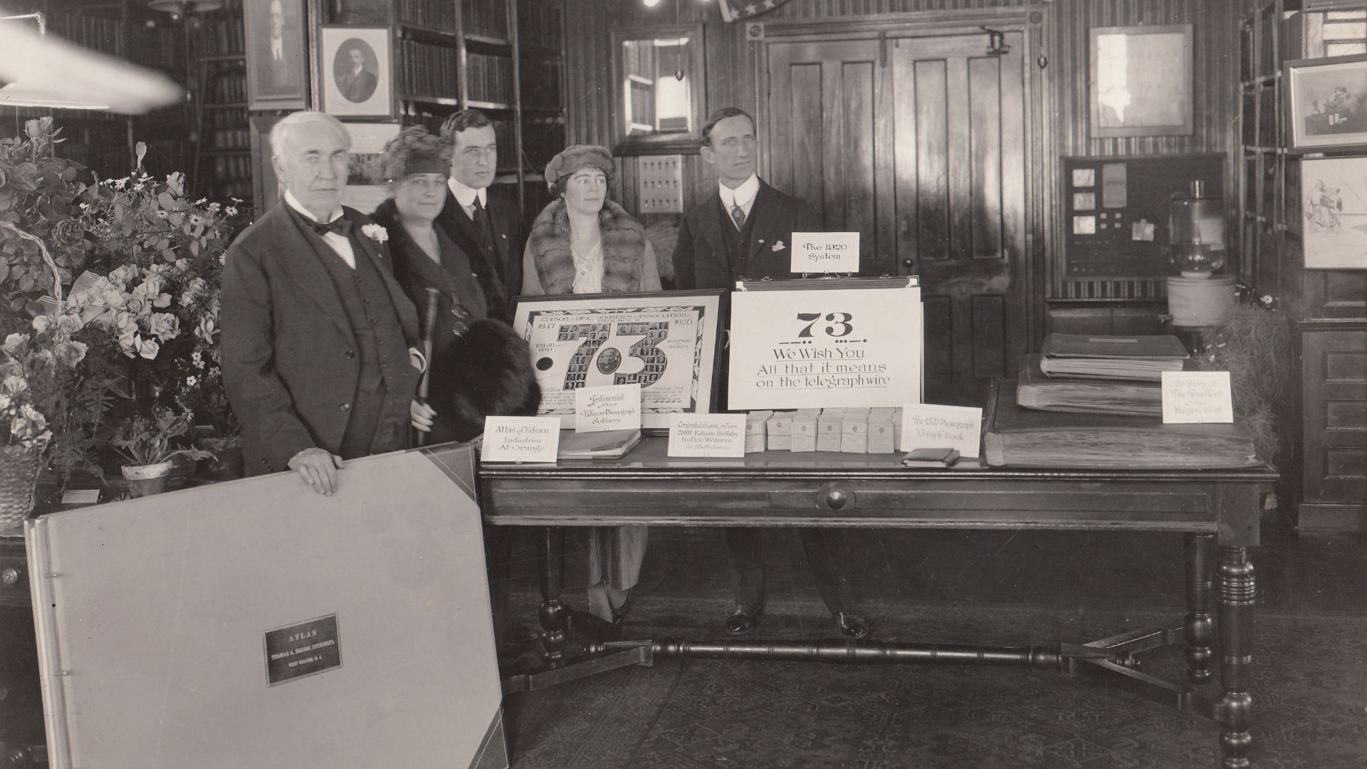 Thomas Edison, Mina Edison, Charles Edison, Mrs. Charles Edison, and Thomas Edison, Jr., in library on Thomas Edison's 73rd birthday.
Keywords: thomas edison; mina miller edison; laboratory complex; building 5; building 5 interior; building 5 library; cha
