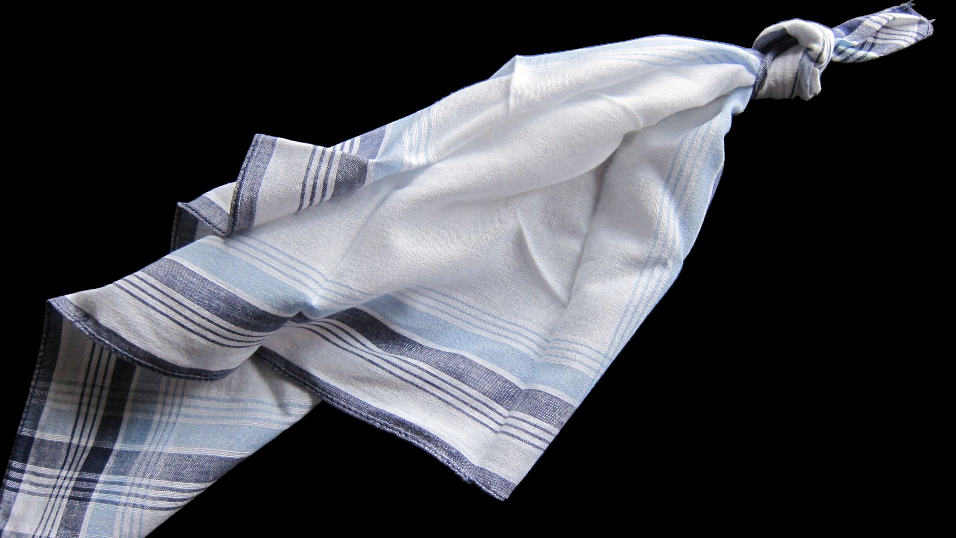 A knot in a handkerchief to act as a reminder