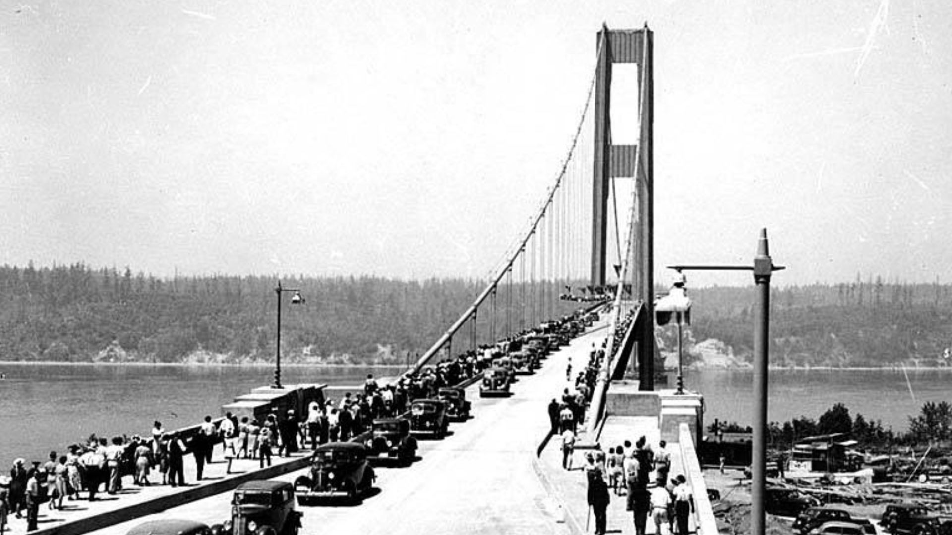 Opening day of the Tacoma Narrows Bridge, Tacoma, Washington, July 1, 1940
Photographer:
Unknown
Subjects (LCSH):
Tacoma Narrows Bridge (Tacoma, Wash. : 1940)
Bridges--Washington (State)--Tacoma Narrows
Automobiles--Washington (State)--Tacoma
Crowds--Wash