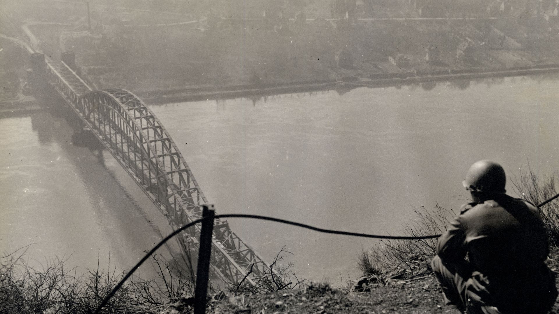 A view of Ludendorff Bridge from the top of Erpeler Ley. Dan Feltner, 656 Tank Destroyer (TD) Battalion Co. C.. overlooks the bridge