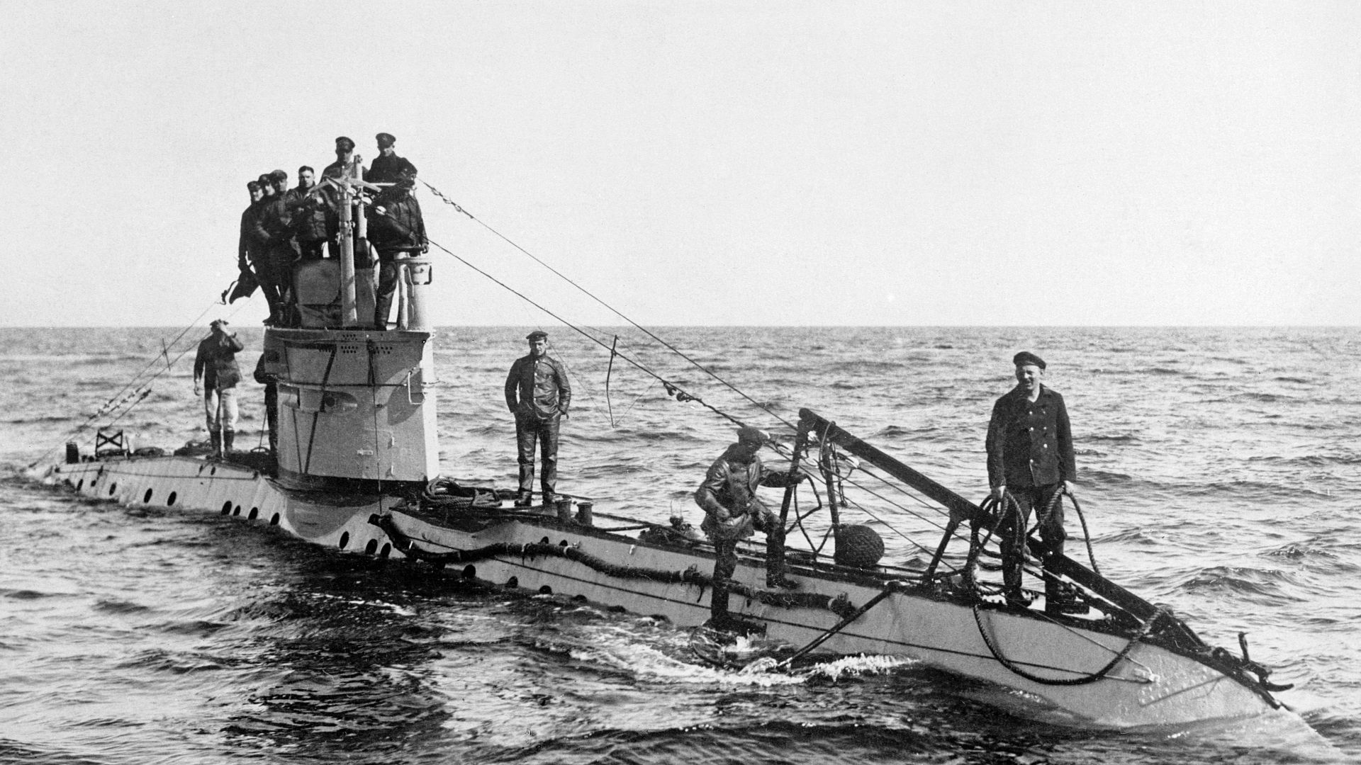 The crew of a German UC-1 class submarine on deck. Introduced in 1915, the submarines of this class were employed mainly on minelaying duties and carried up to twelve mines. German submarines sank 1,845,000 tons of Allied and neutral shipping between Febr