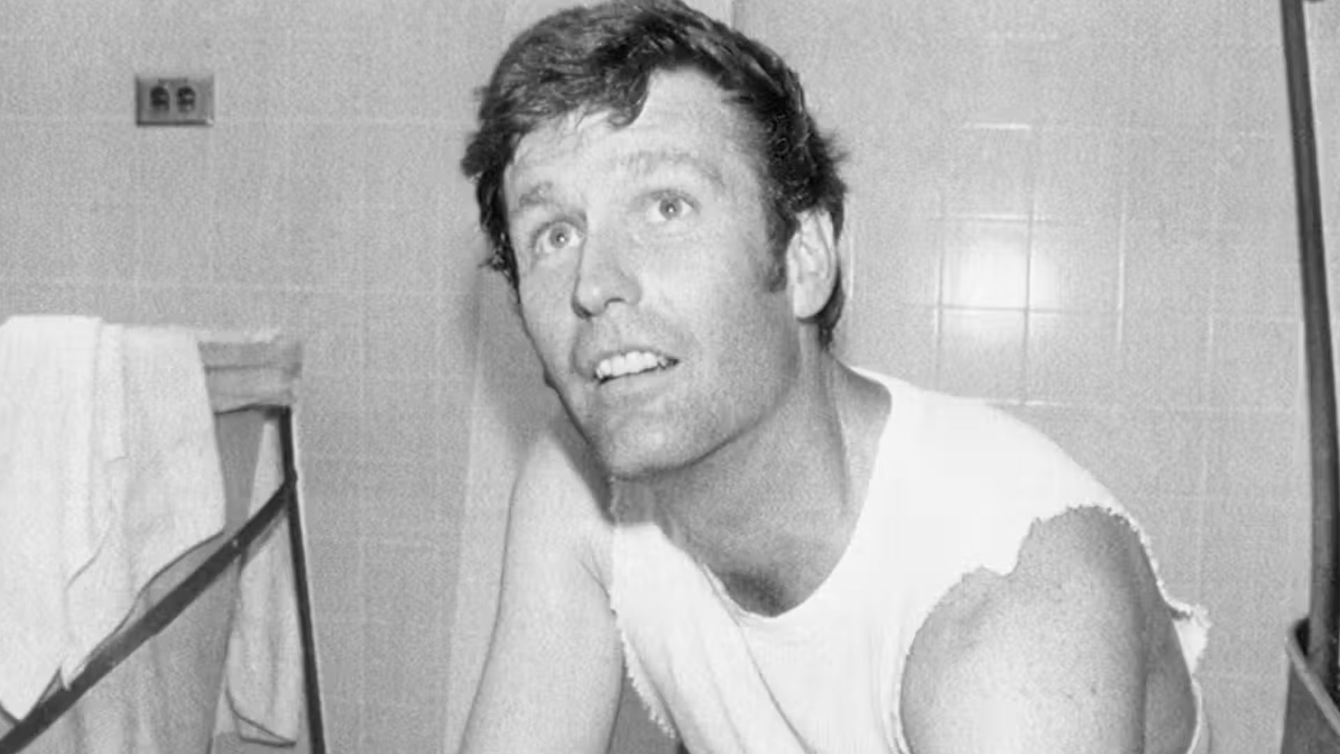 LOS ANGELES -- Tommy John, the National League's winningest pitcher, chills his elbow in ice after learning he may face surgery for the second time in two years and had been placed on the 21-day disabled list. John ruptured an elbow ligament earlier in th