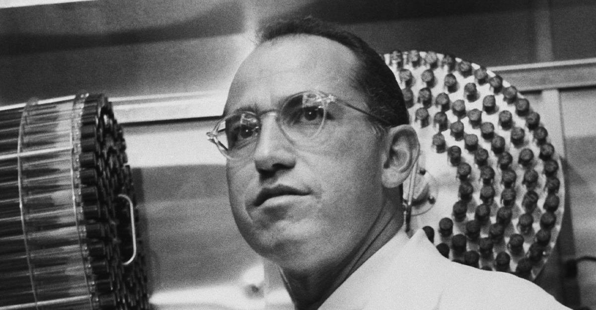Dr. Jonas Salk stands in the University of Pittsburgh laboratory in which he developed a vaccine for polio