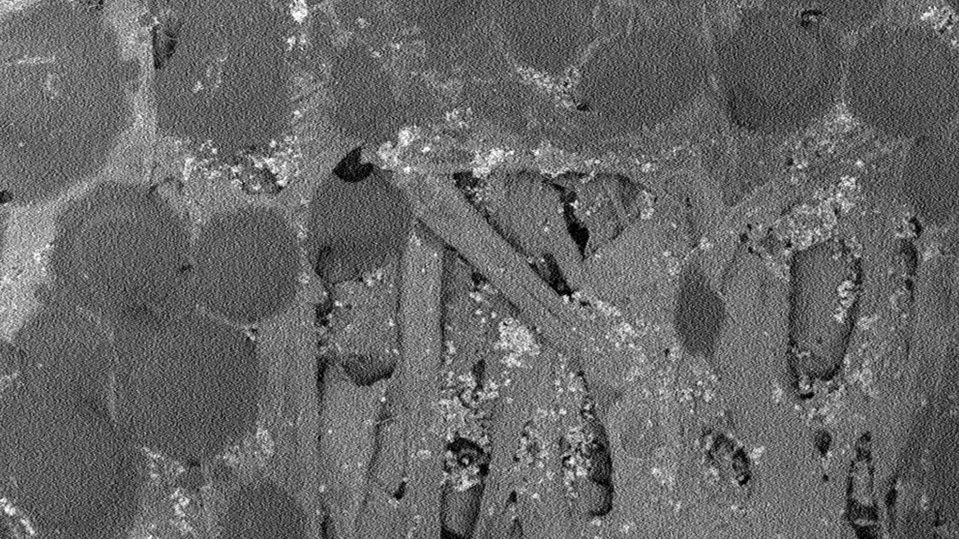 Adhesive side of a post-it note, magnified 555x on an SEM