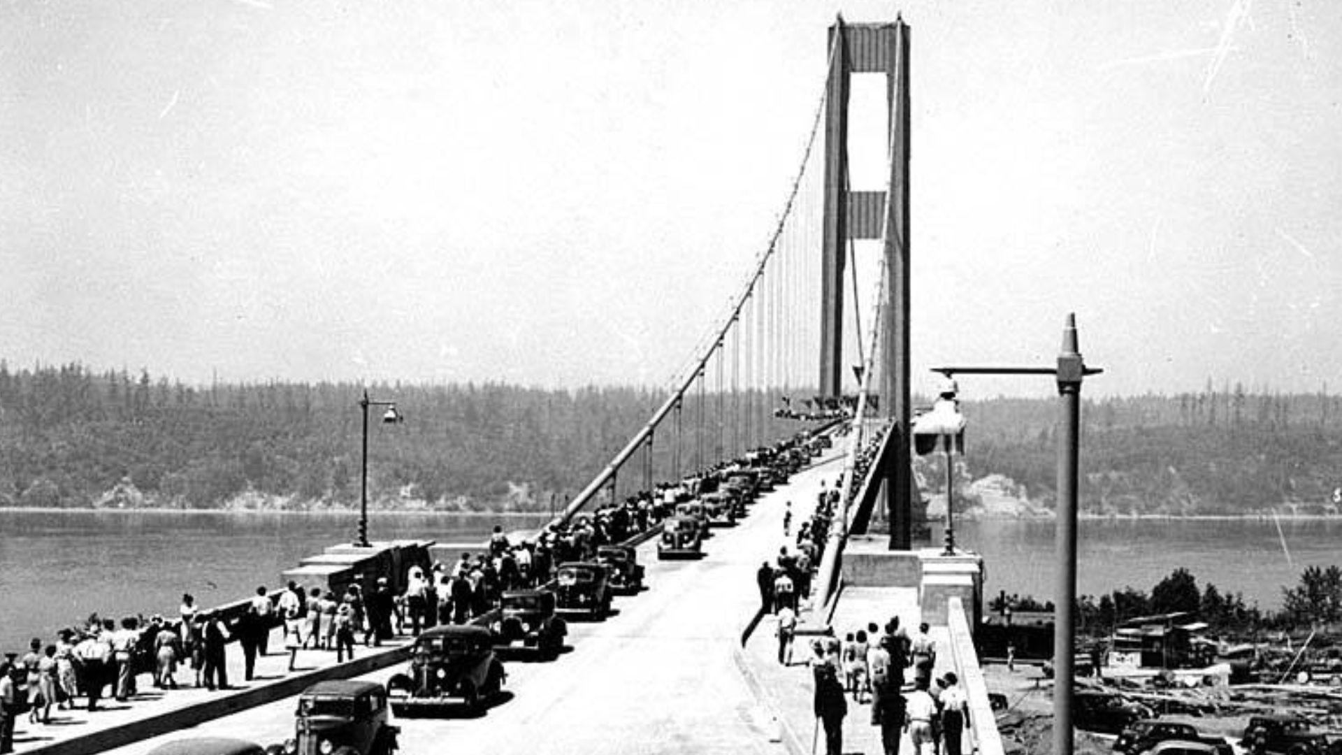 Opening day of the Tacoma Narrows Bridge, Tacoma, Washington, July 1, 1940
Photographer:
Unknown
Subjects (LCSH):
Tacoma Narrows Bridge (Tacoma, Wash. : 1940)
Bridges--Washington (State)--Tacoma Narrows
Automobiles--Washington (State)--Tacoma
Crowds--Wash