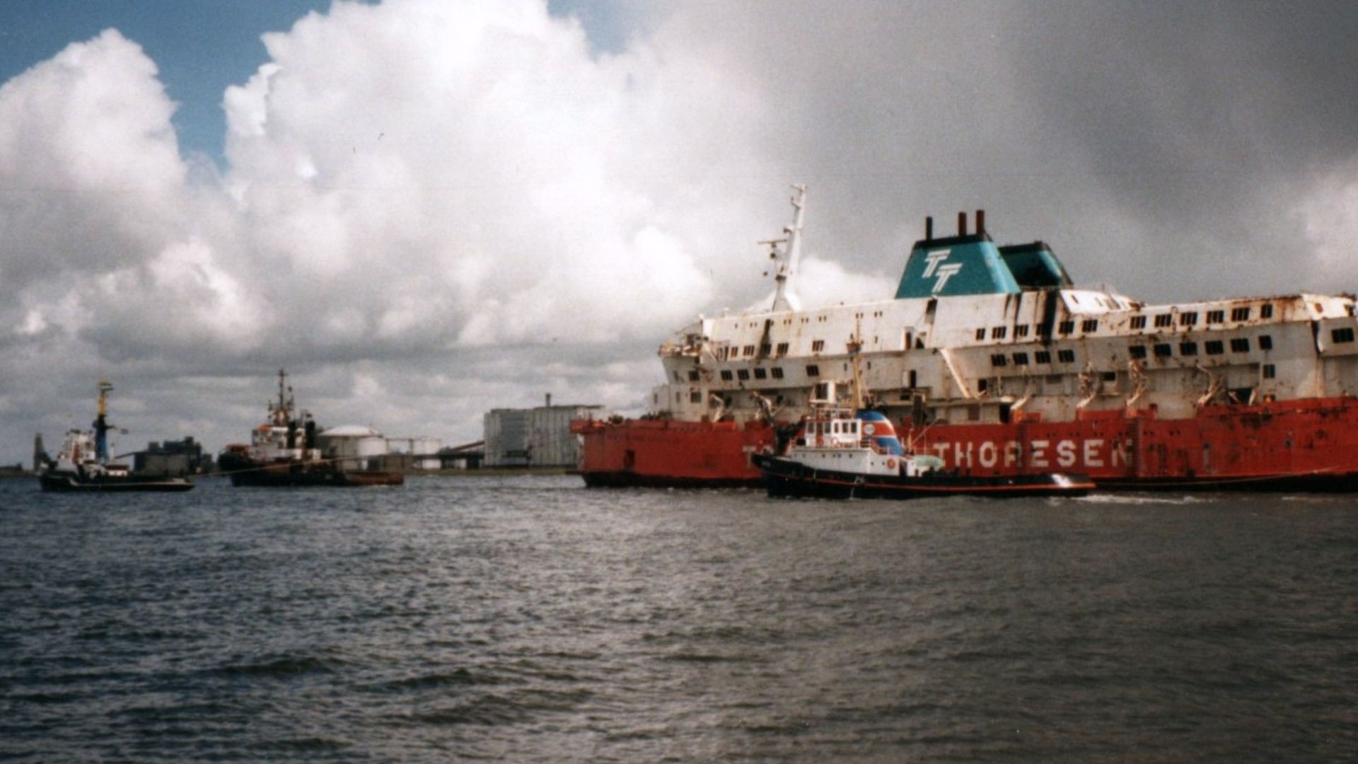 MS Herald of Free Enterprise being towed into the harbour of Vlissingen, Netherlands after salvage.
