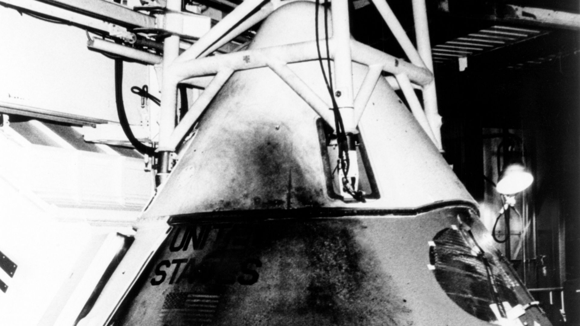 This photograph shows Apollo 1's Command Module a day after the fire that took the lives of astronauts Lt. Col. Virgil