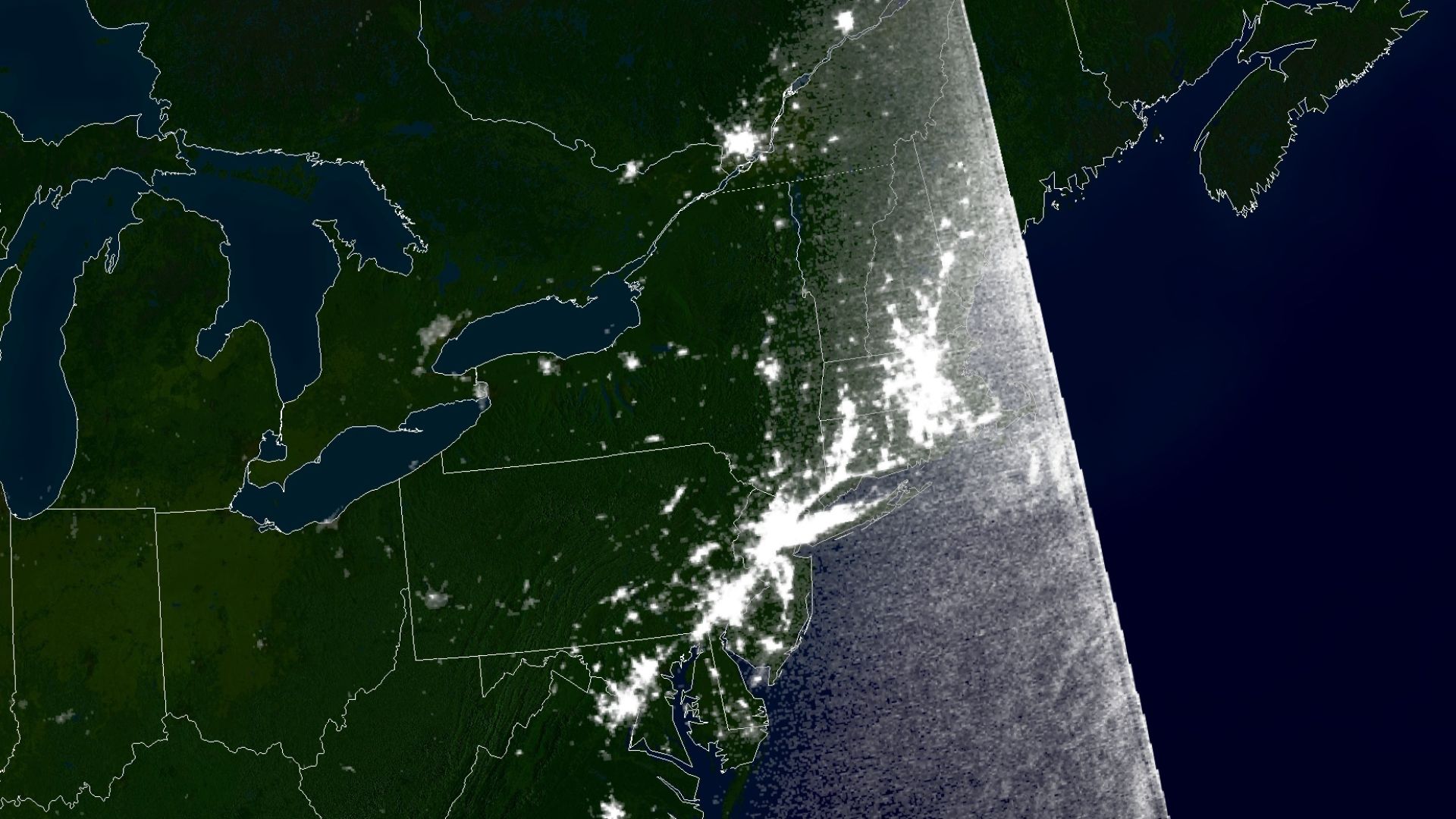 Satellite imagery from the Northeast Blackout of 2003. This image shows light activity from the night before the blackout, August 13, 2003, at 9:21 p.m. EDT (081403-0121z). Imagery data provided by the National Oceanic and Atmospheric Administration and t