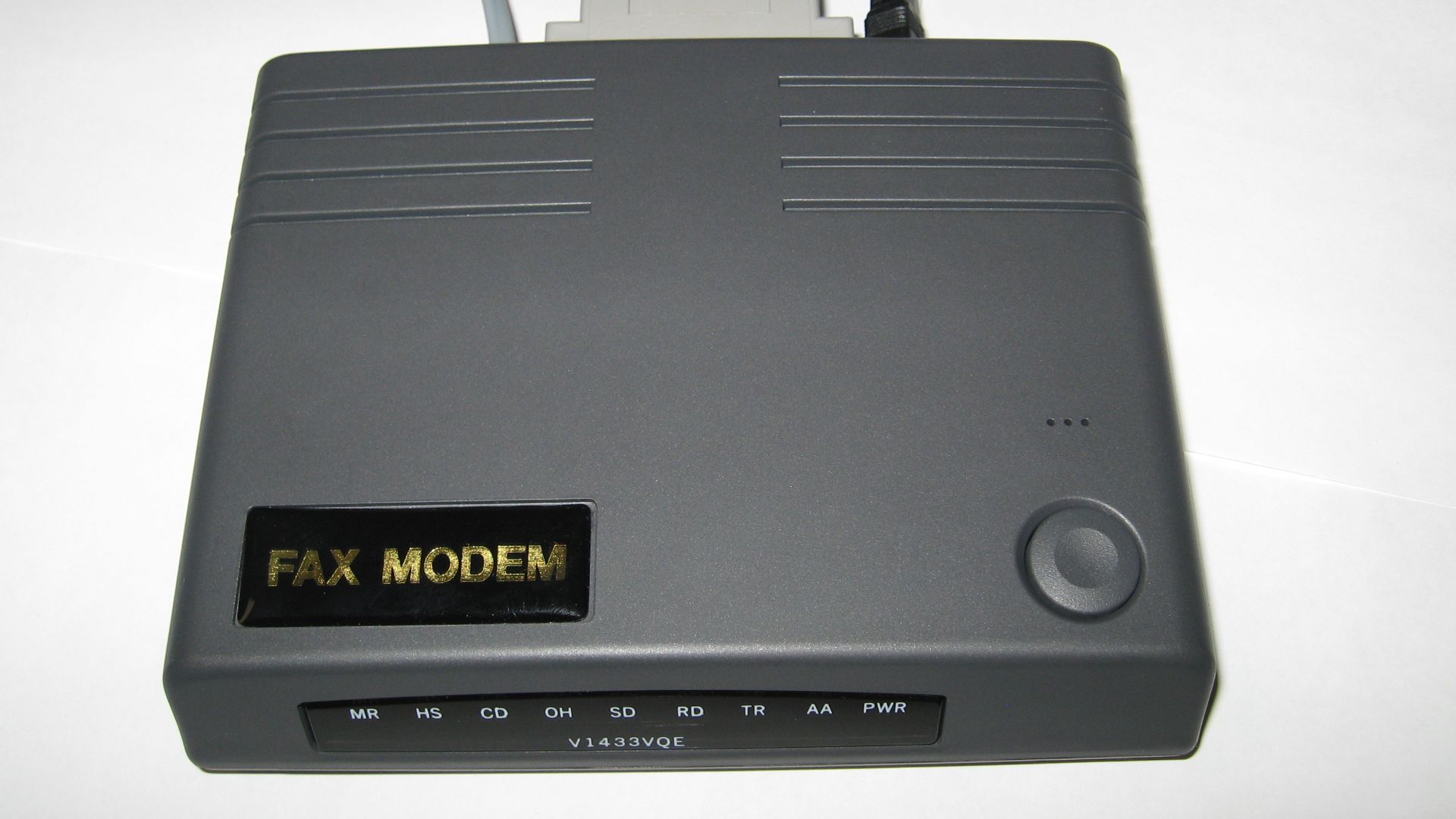 External 33.6kbit/sec serial port dial-up modem.