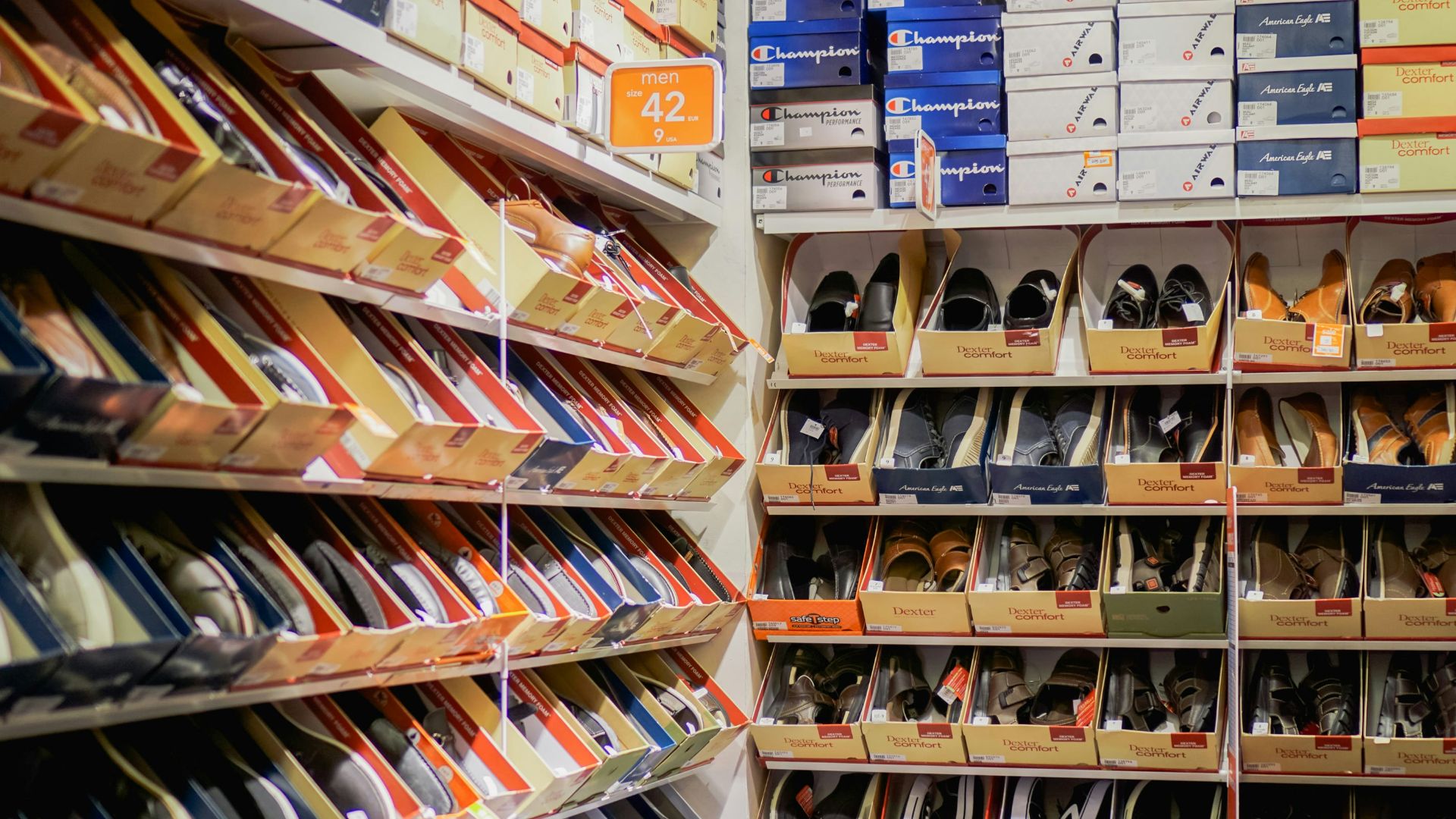 assorted pairs of shoes on boxes