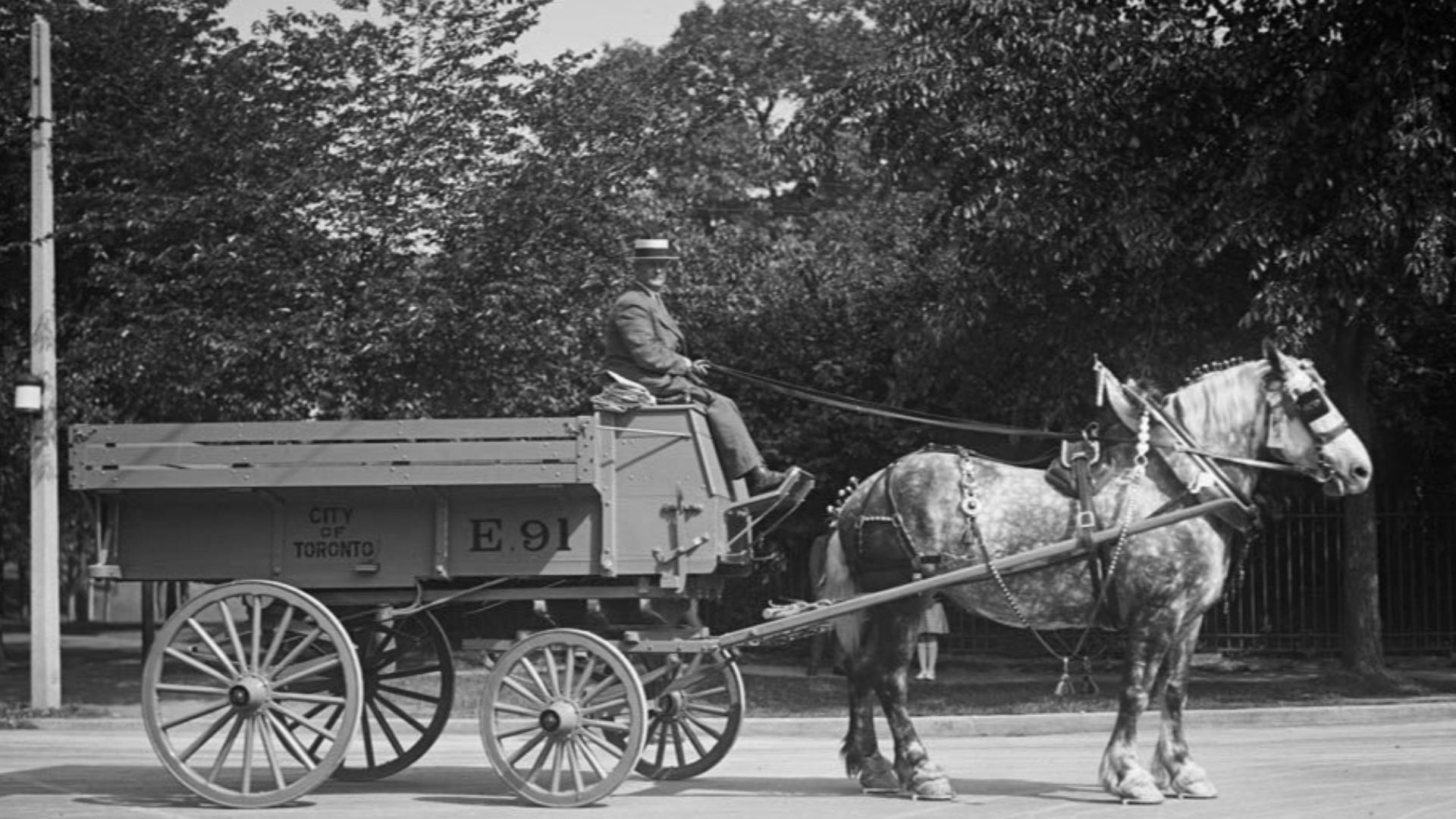 Horse-drawn wagon for street cleaning.  Toronto, Canada.