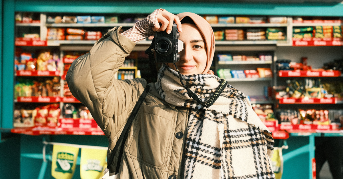 woman-taking-photo-with-a-camera