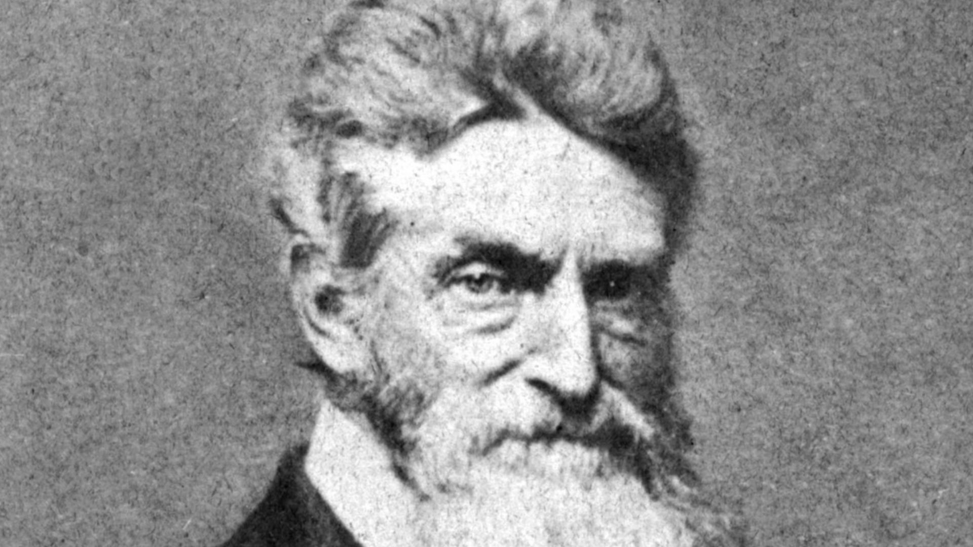 Salt print, cropped from three quarter length portrait of John Brown.  Reproduction of daguerreotype attributed to Martin M. Lawrence.