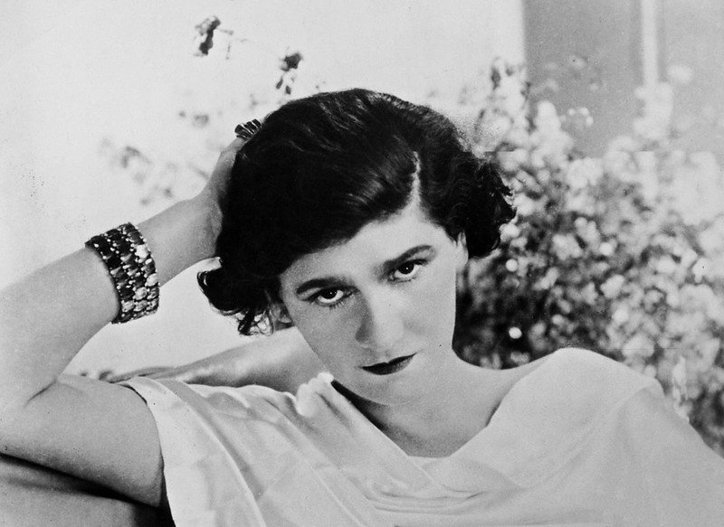 Coco Chanel in a white shirt