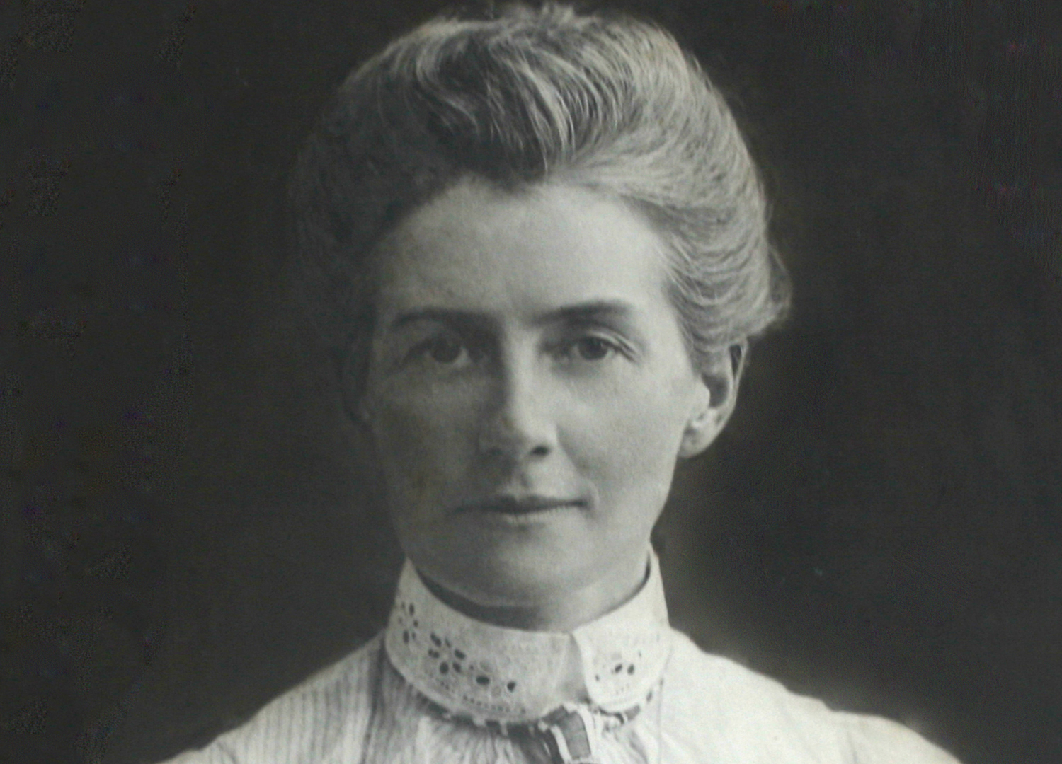 Edith Cavell in white shirt
