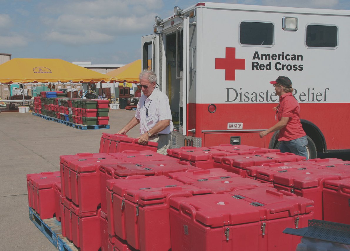 Red Cross loading food containers in Texas