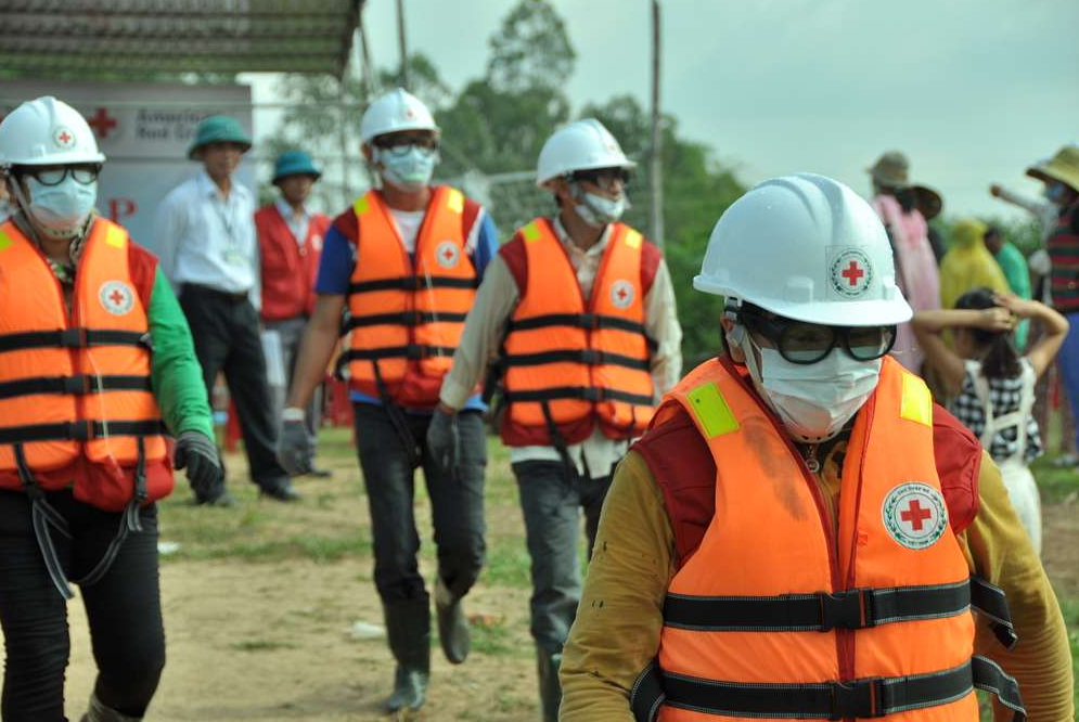 USAID and Red Cross workers