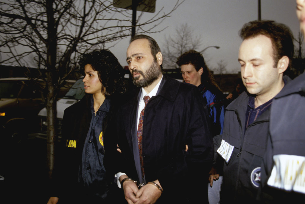 Eddie Antar, owner of Crazy Eddie electronics stores is escorted by FBI agents