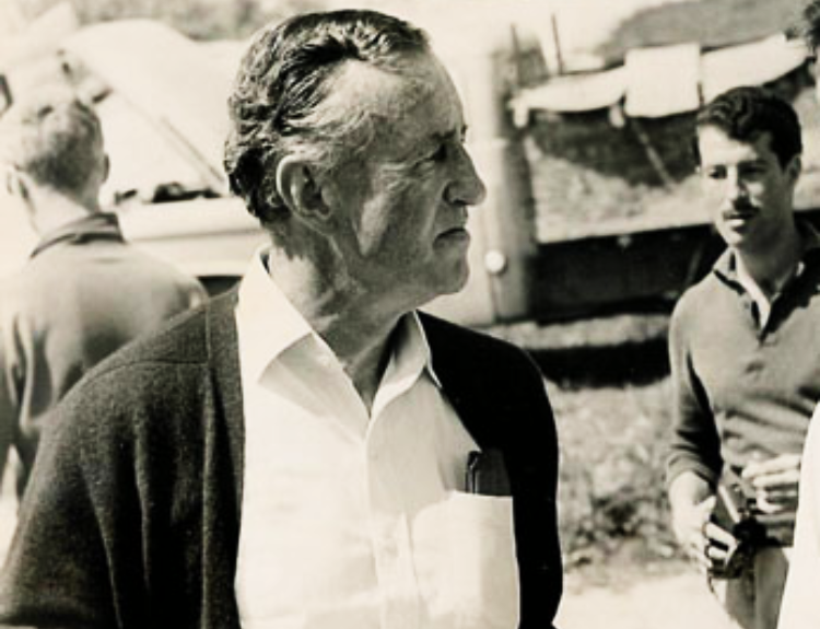 Ian Fleming wearing a white shirt