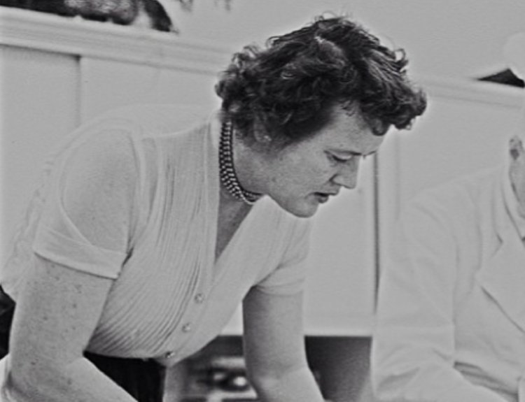 Julia Child wearing a white shirt