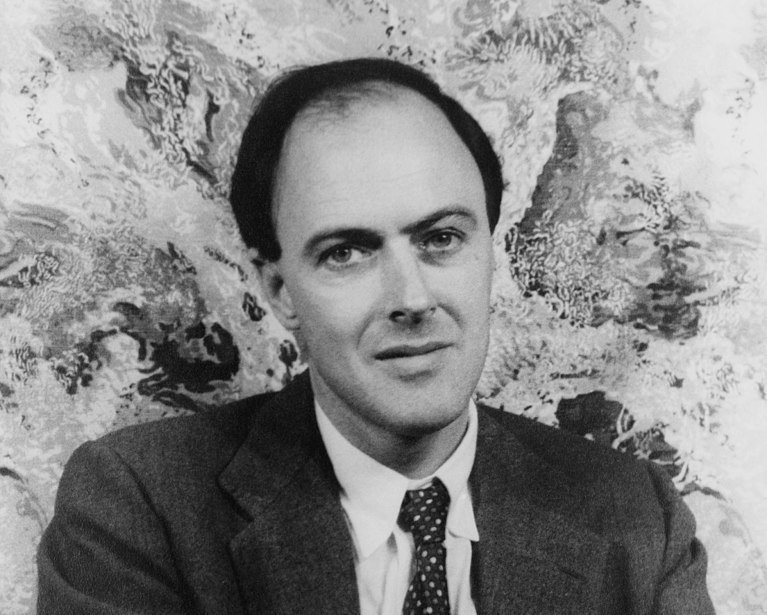 Roald Dahl wearing a suit