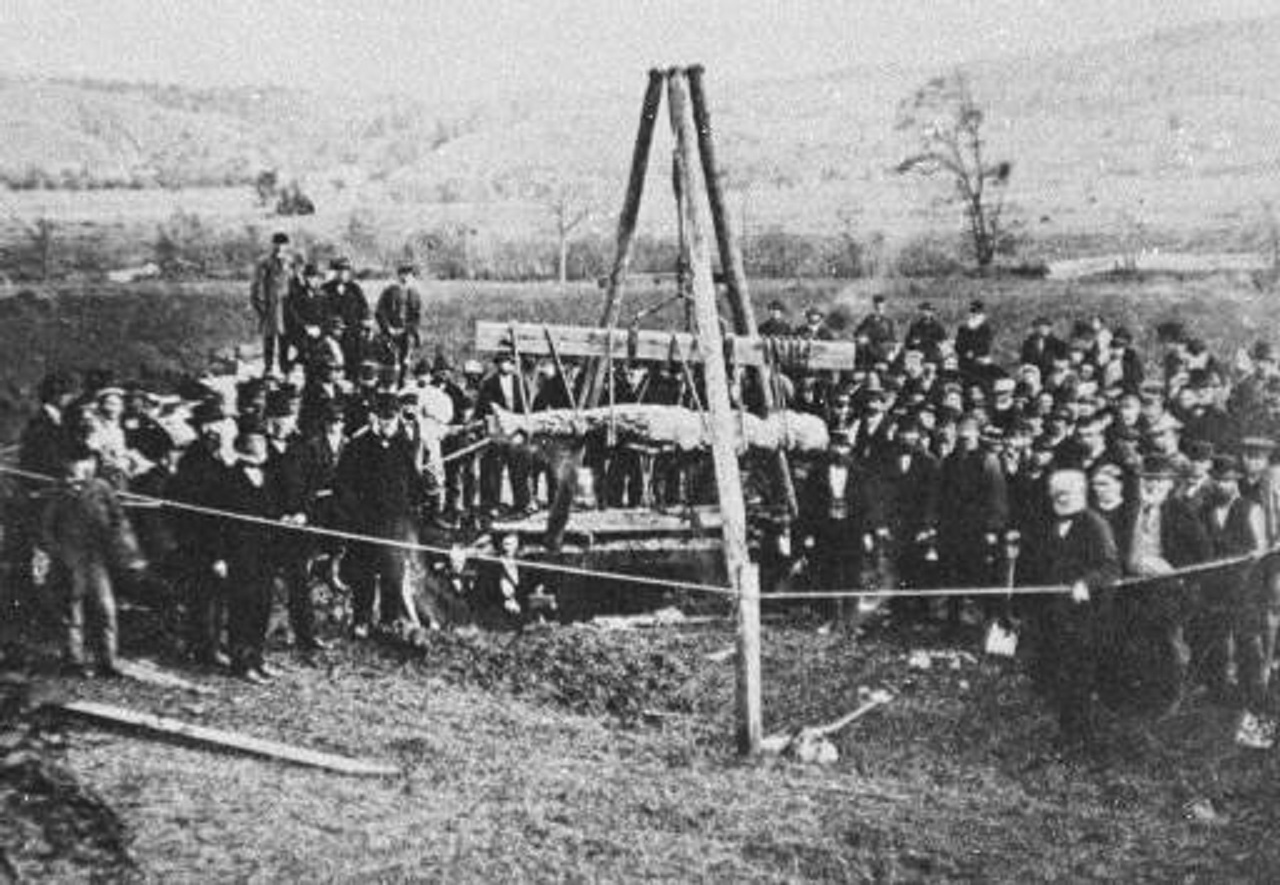 An October 1869 photograph showing the Cardiff Giant being exhumed.