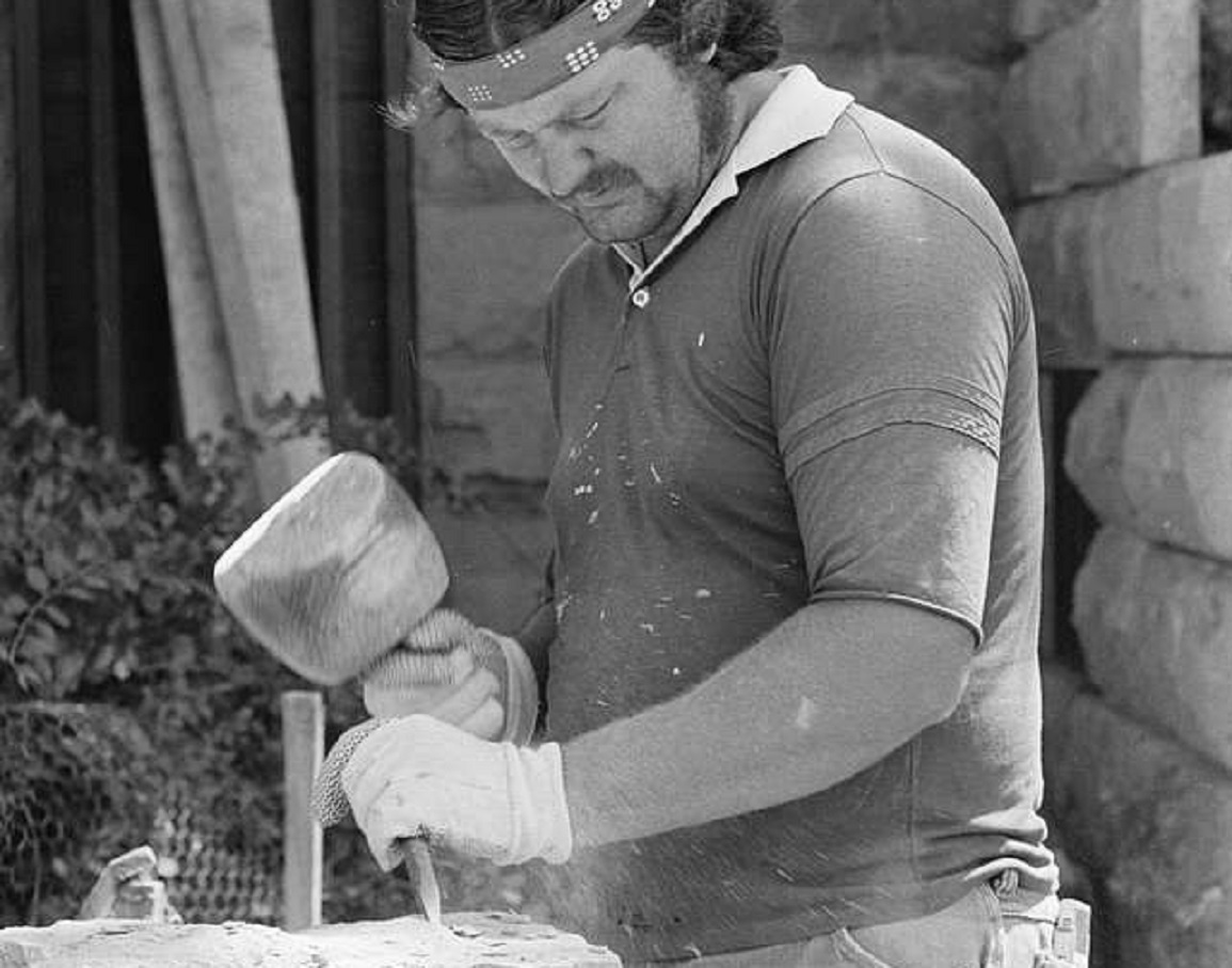 Stonecutter working on a stone - 1979