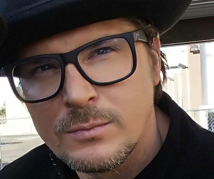 Portrait Photo of Zak (Zachary) Alexander Bagans wearing black outfit