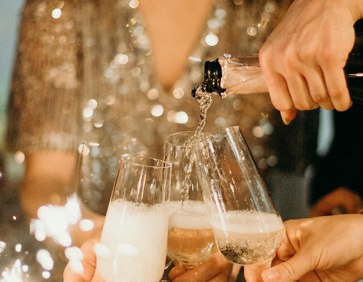 Person Pouring Champagne.