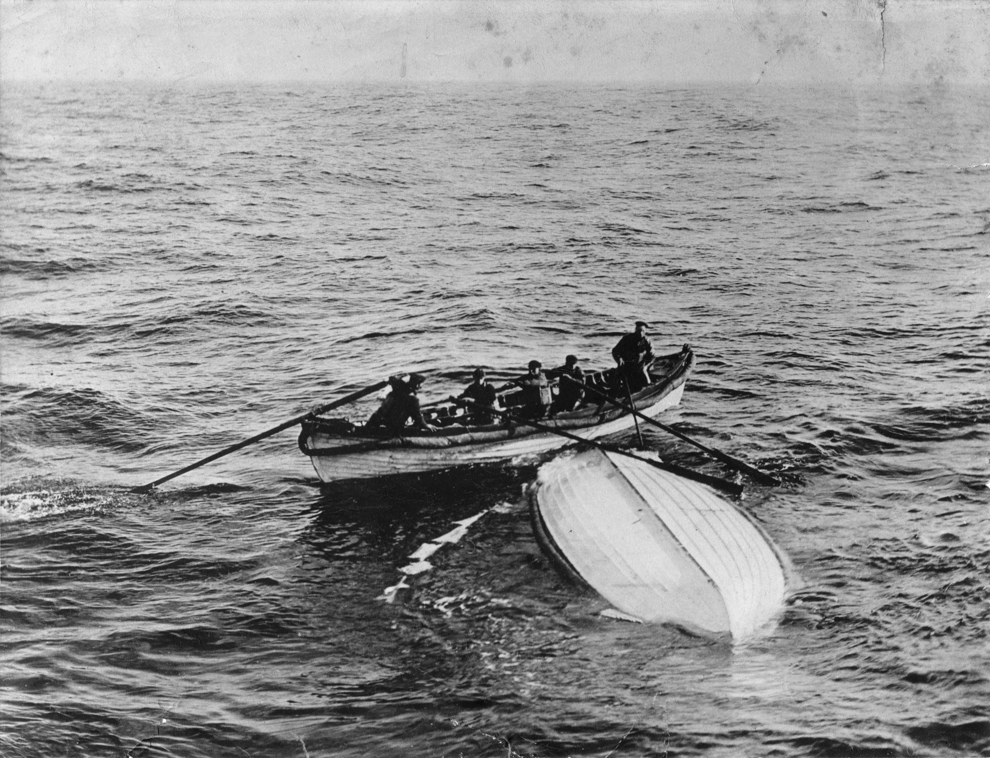 Charles Lightoller saved from lifeboat
