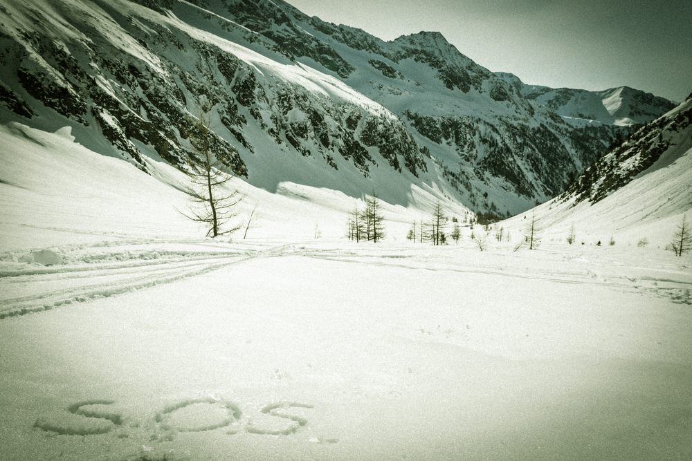 S.O.S. written in the snow