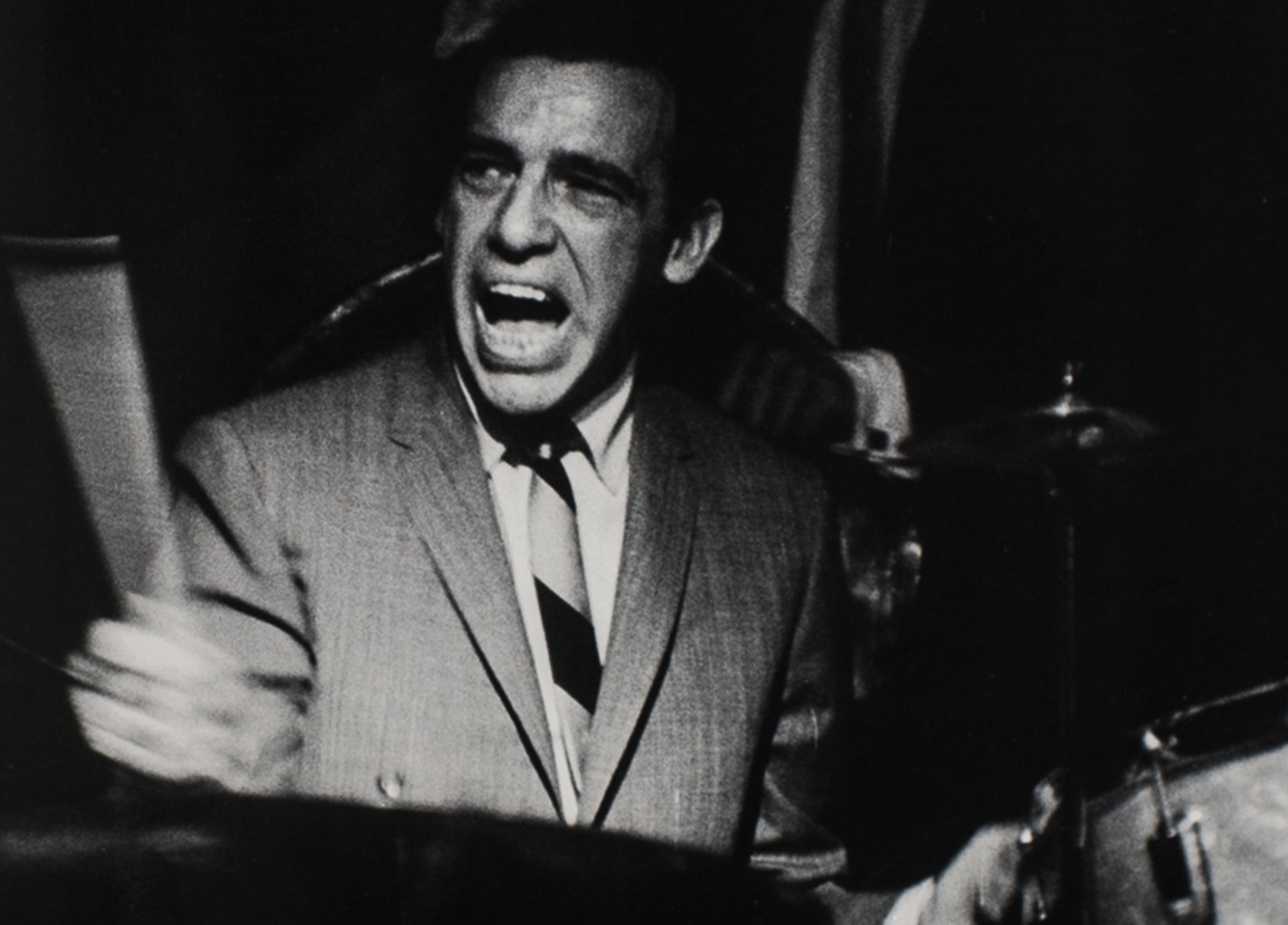 Buddy Rich playing on drums.