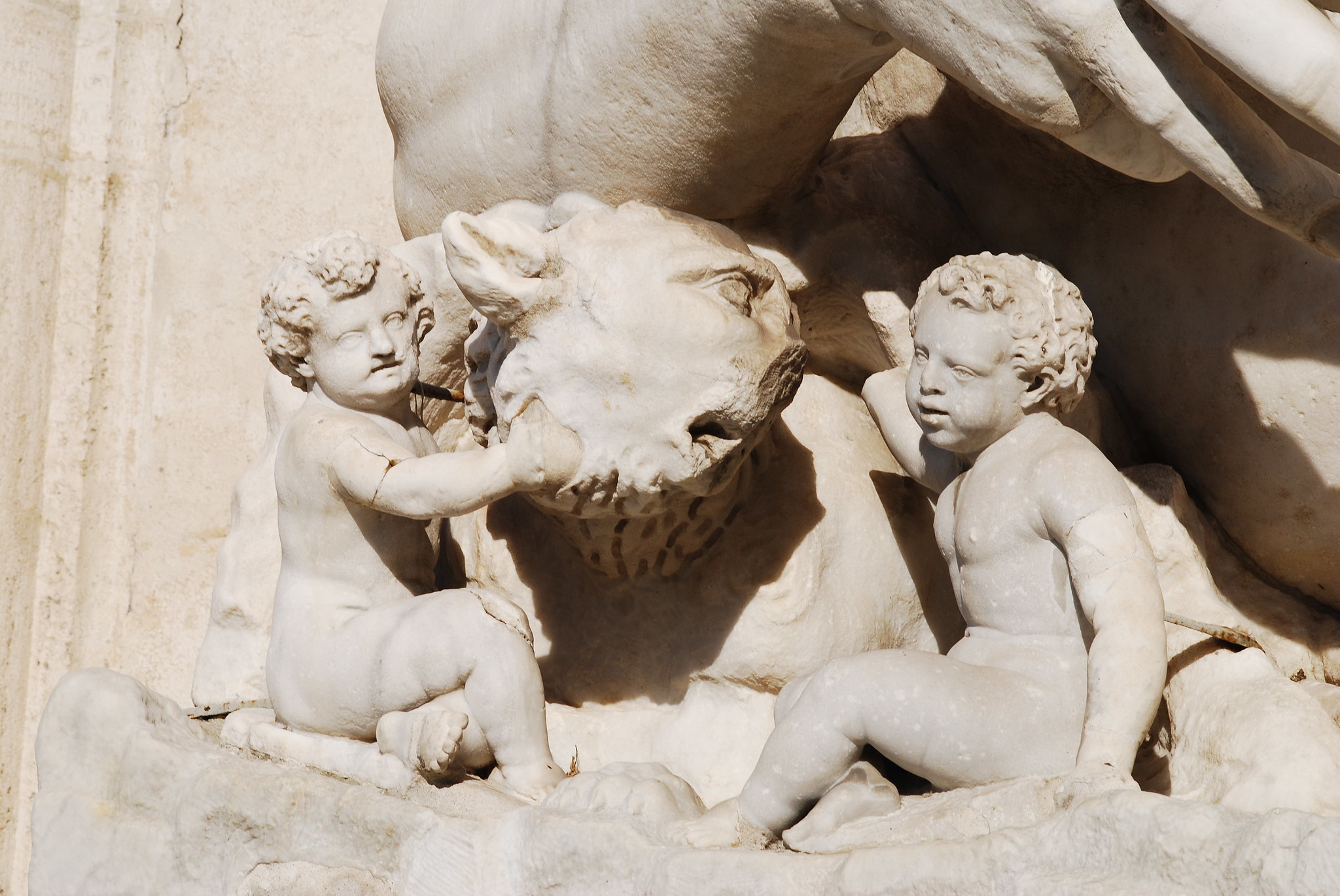 Romulus & Remus ,In the company of the wolf feeding them - stone