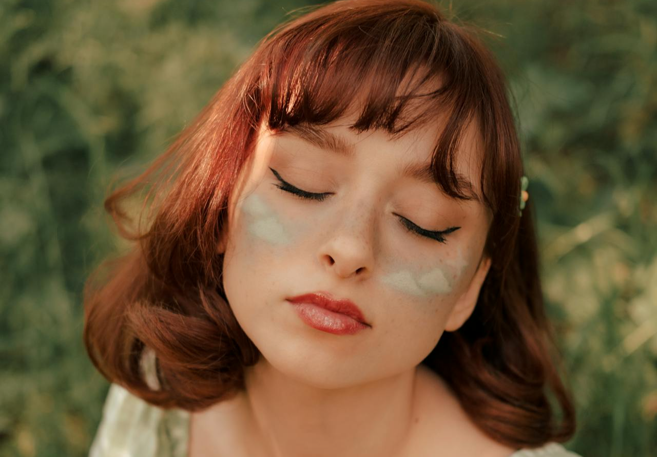 Portrait of Woman with Closed Eyes