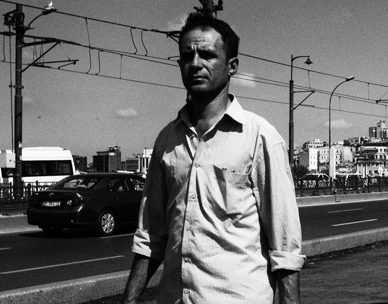 Grayscale Portrait Photo of Jack Kerouac in a white shirt