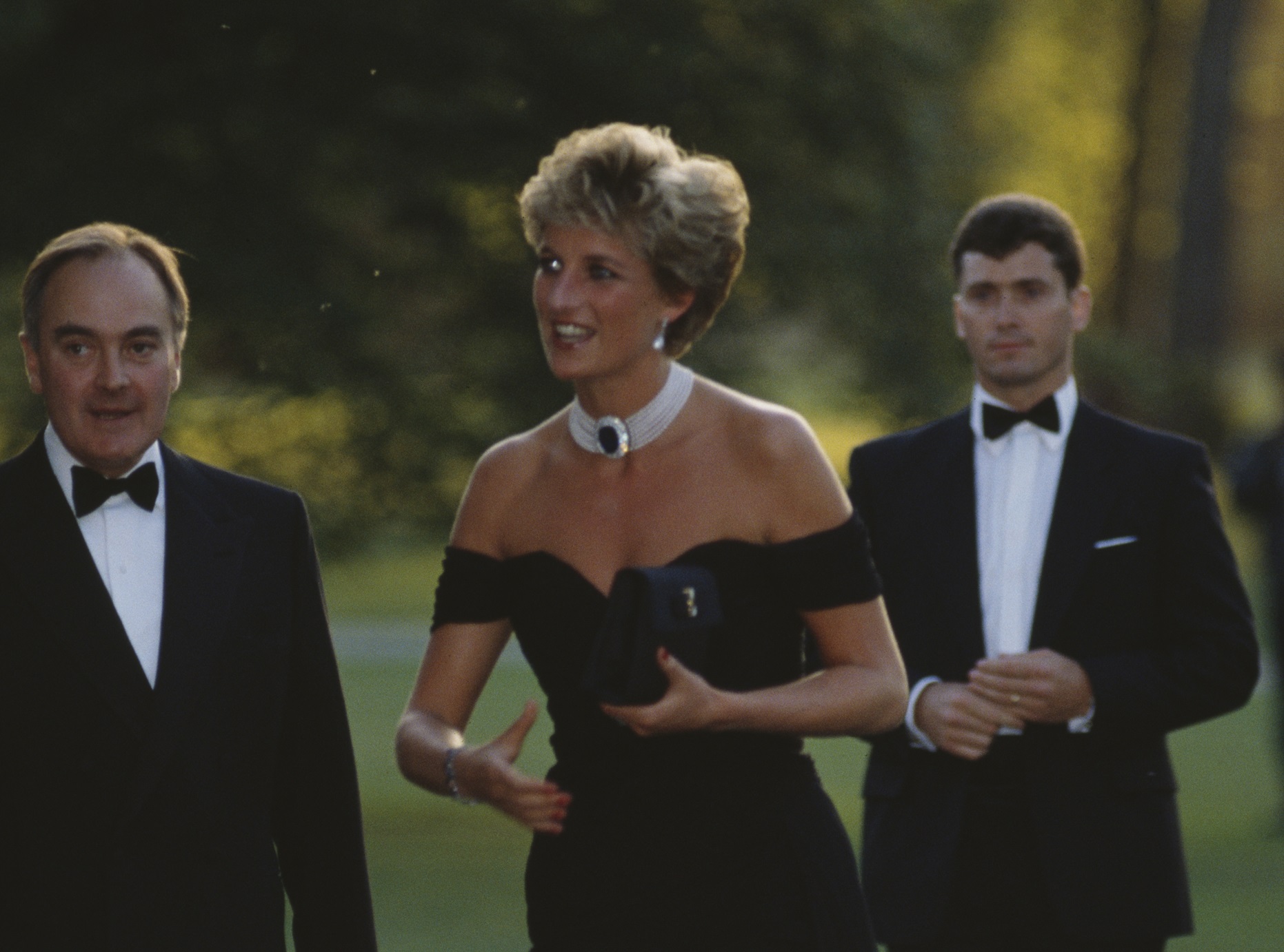 British property developer Peter Palumbo and British royal Diana, Princess of Wales wearing a black Christina Stambolian dress - 1994