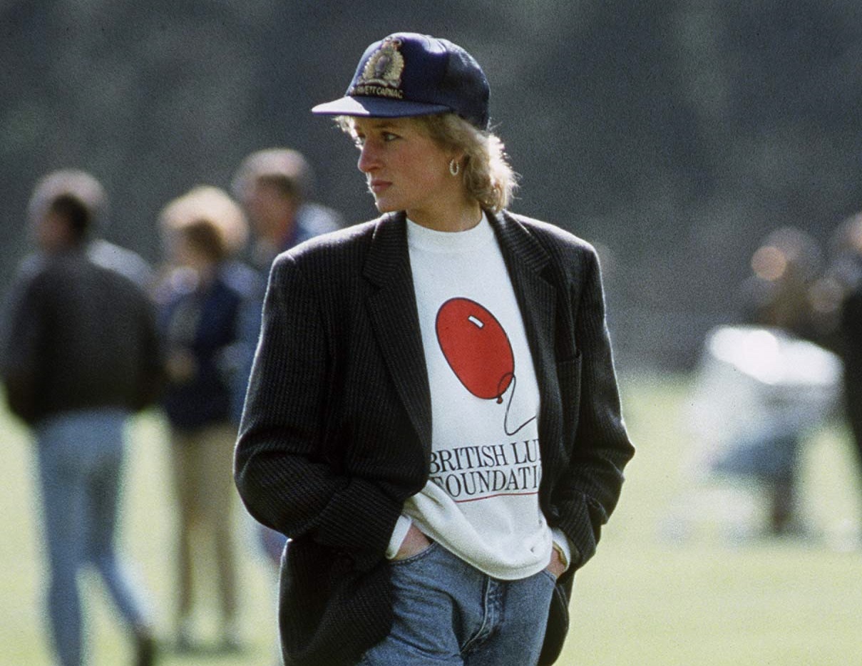The Princess Diana Is Casually Dressed In A Sweatshirt With The British Lung Foundation Logo On The Front - 1988