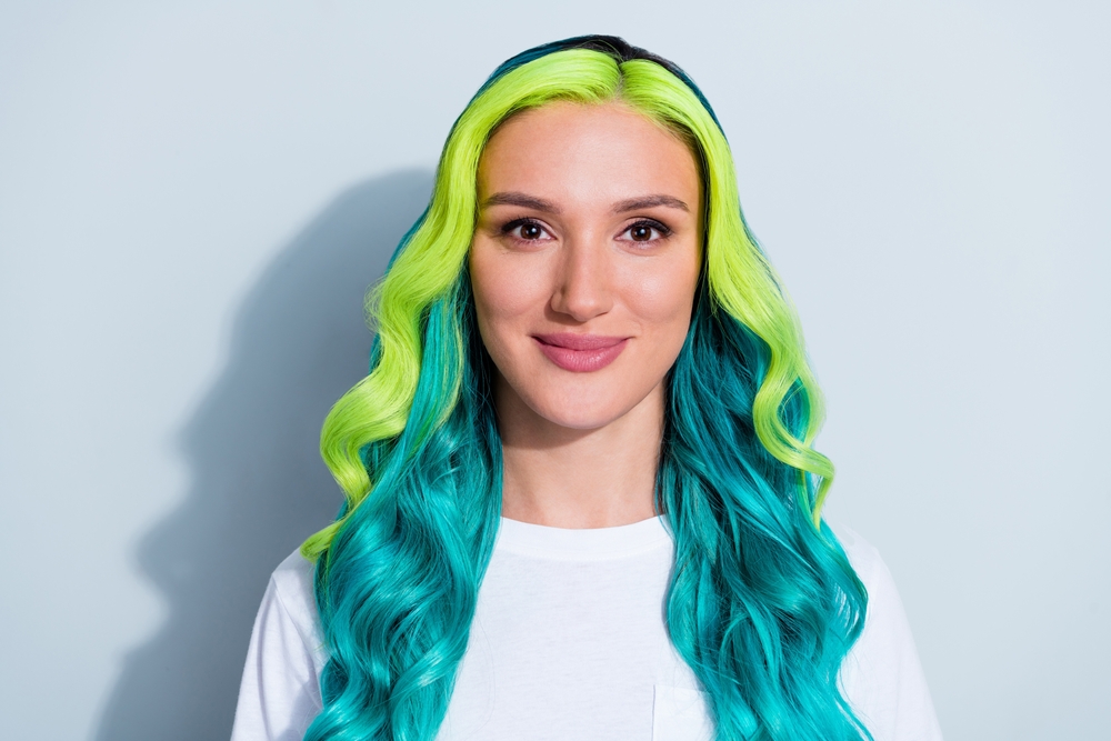 Photo of adorable pretty vibrant gradient hair girl