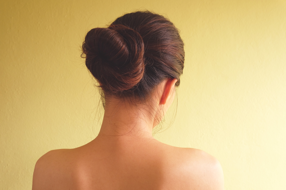 back woman and hair chignon