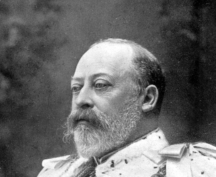 Grayscale Portrait Photo of King Edward VII on Dark Background.
