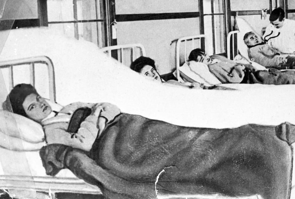 Grayscale Portrait Photo of Mary Mallon in a hospital bed