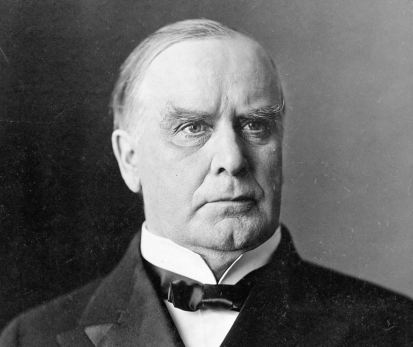 Grayscale Portrait Photo of U.S. President William McKinley in a dark suit