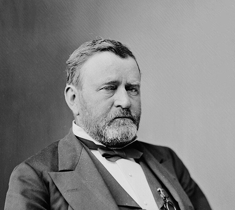 Grayscale Portrait Photo of U.S. President Ulysses S. Grant in a dark suit