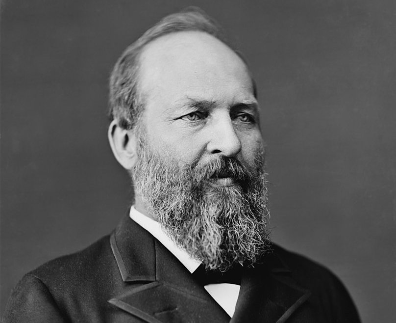 Grayscale Portrait Photo of U.S. President James Abram Garfield in a dark suit