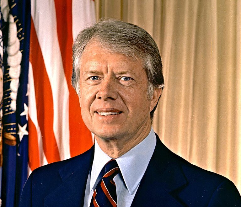 Portrait Photo of U.S. President Jimmy Carter in a dark blue suit