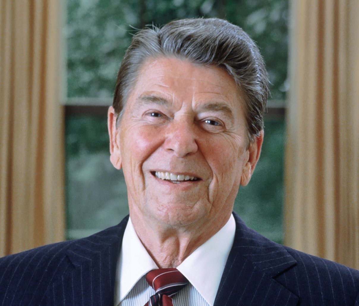 Portrait Photo of U.S. President Ronald Reagan in a dark blue suit
