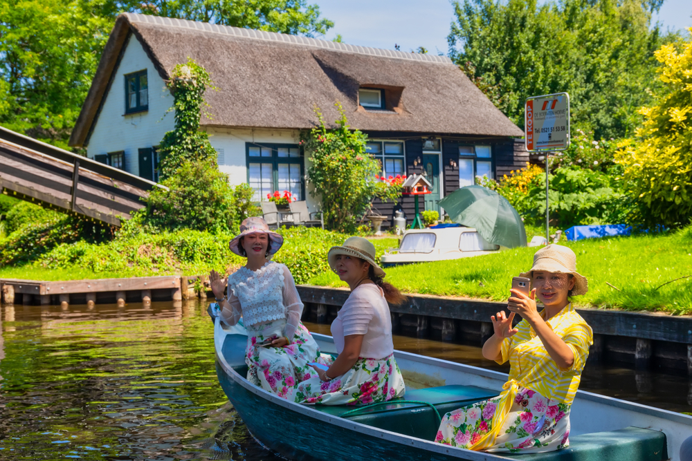 view of famous village Giethoorn with canals in the Netherlands